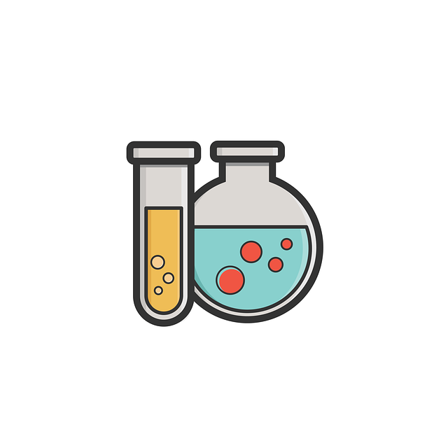 A test tube amd a beaker with bubbling liquid
